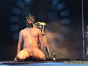 crazy fetish syringe demonstrate on stage