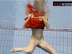 wonderful super-hot lady swimming in the pool